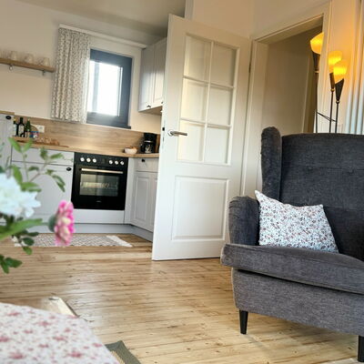 Wohnzimmer der Ferienwohnung Eifelcottage auf dem Landgut Pfauenhof in der Eifel